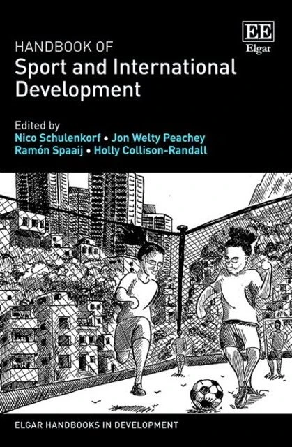 Book cover of Handbook of Sport and International Development by Nico Schulenkorf, Jon Welty Peachey, Ramon Spaaij, Holly Collison-Randall from Elgar Handbooks in Development. On the cover is a sketch of two women kicking a football, the goalie net in the distance. The fenced football pitch in the sketch is on a rooftop. Beyond the fence are multi-story apartments and high-rise buildings.