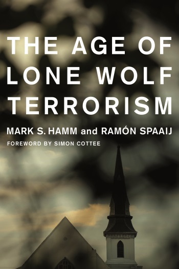 Book cover of The Age of Lone Wolf Terrorism by Mark S. Hamm and Ramon Spaaij with forward by Simon Cottee